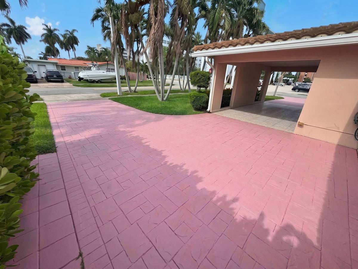 Free driveway and carport parking for four cars at the Hallandale Beach house