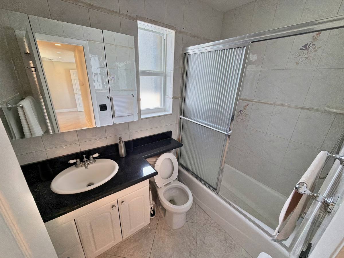 Second full bathroom with shower in the 3-bedroom Hallandale Beach rental